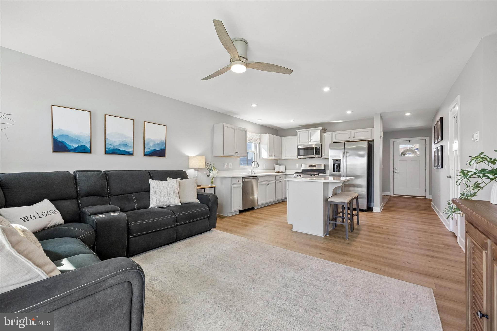 48 Senators Way Berlin, NJ 08009 - Photo 20 of 35 a living room with furniture and kitchen view