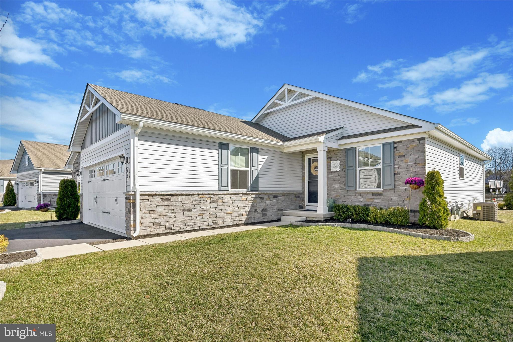 48 Senators Way Berlin, NJ 08009 - Photo 2 of 35 a front view of a house with a yard