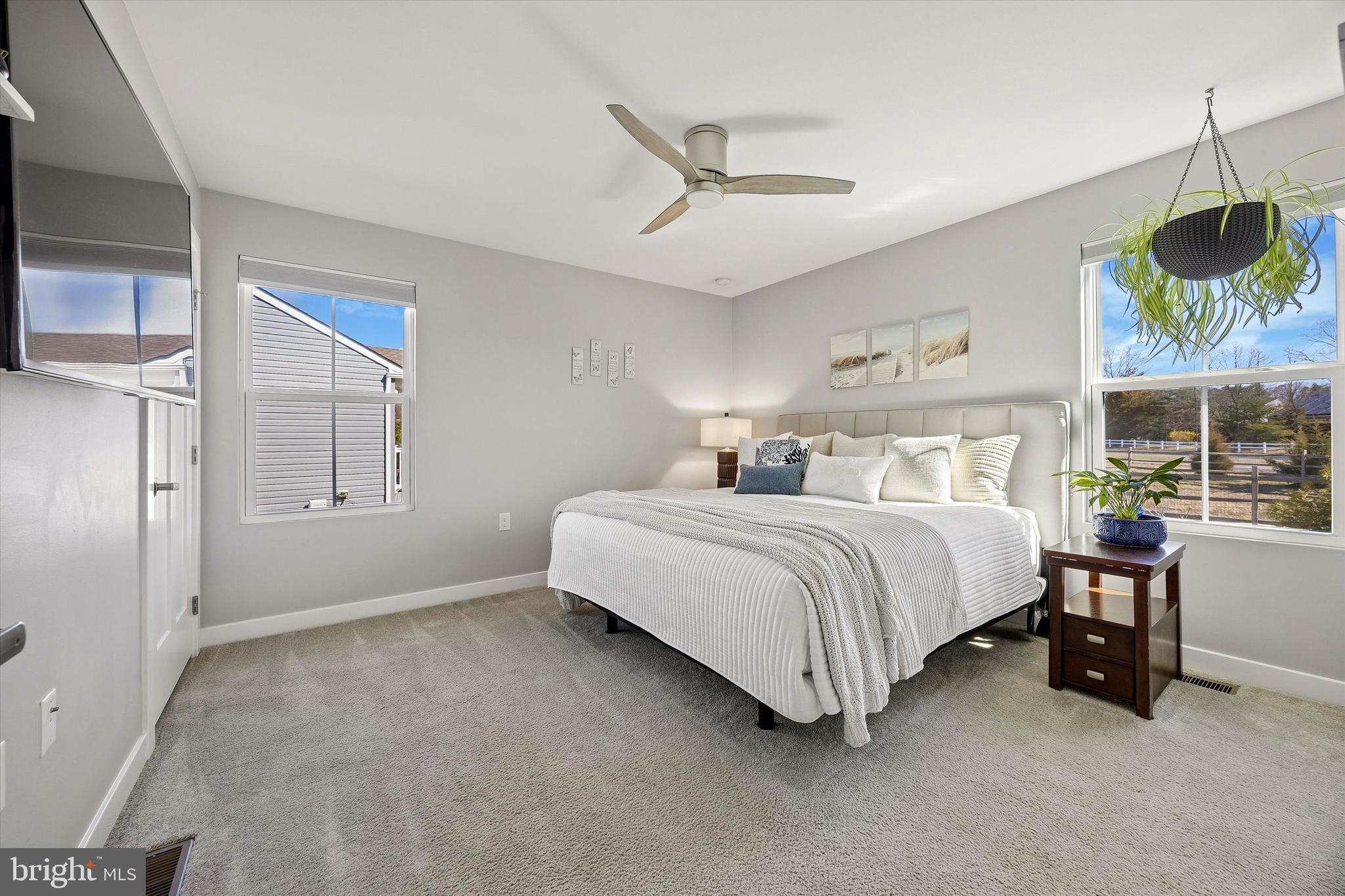 48 Senators Way Berlin, NJ 08009 - Photo 27 of 35 a bedroom with a bed dresser and a window