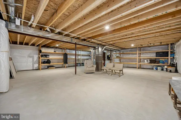 a view of parking garage with cars