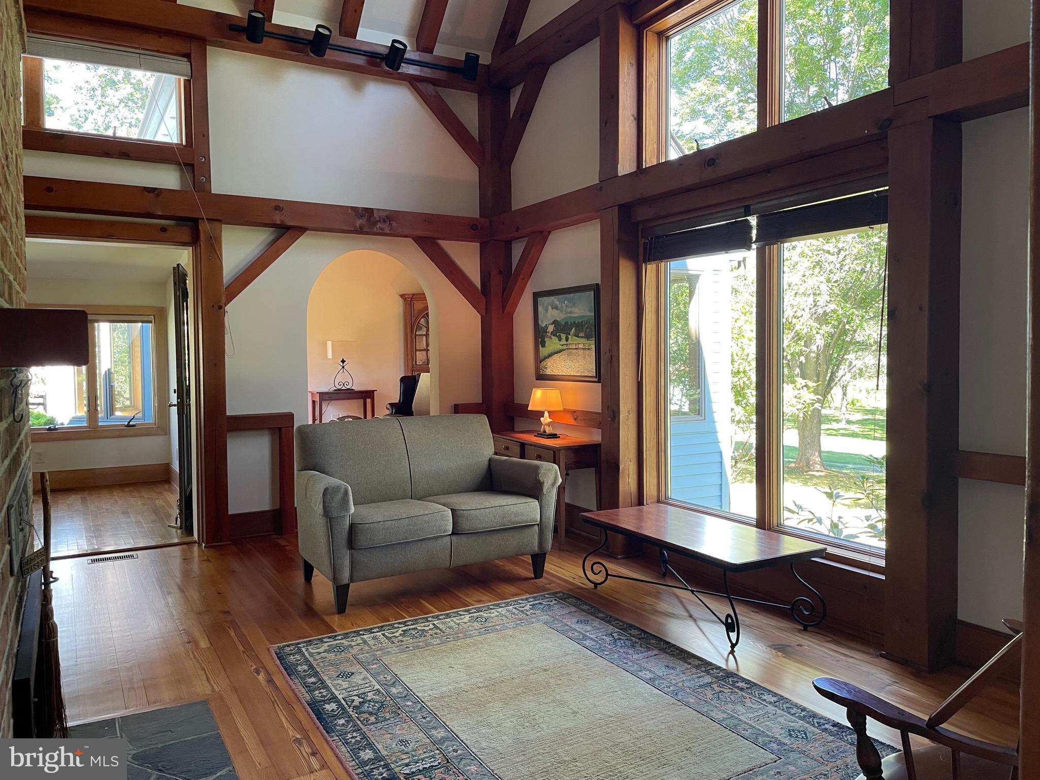 521 Dearing Road Huntly, VA 22640 - Photo 17 of 42 a living room with furniture and a large window
