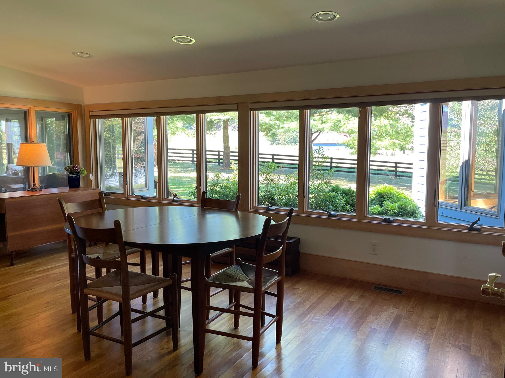 521 Dearing Road Huntly, VA 22640 - Photo 20 of 42 a dining room with furniture and wooden floor