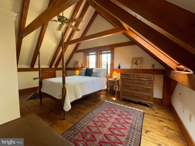 a room with pool table table and chairs