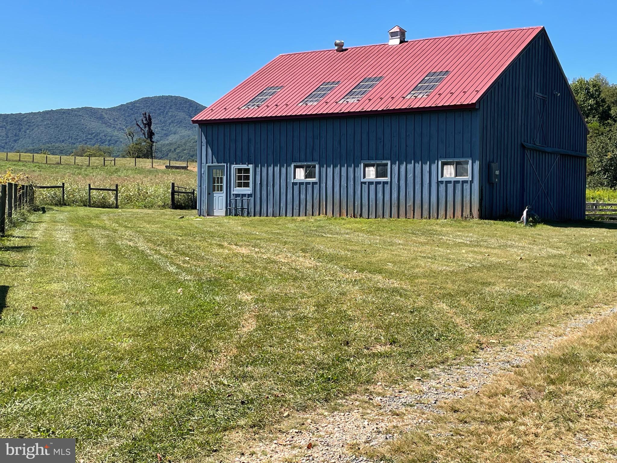 521 Dearing Road Huntly, VA 22640 - Photo 33 of 42 a front view of a house with a yard