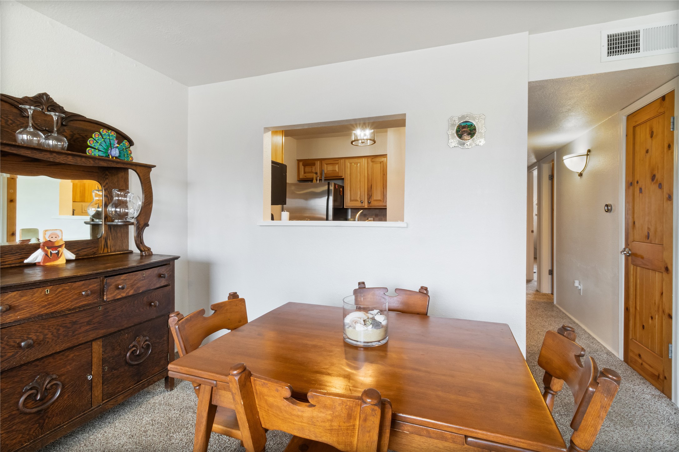 DINING AREA NEXT TO KITCHEN AREA