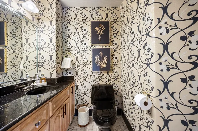 a kitchen with a stove and a sink