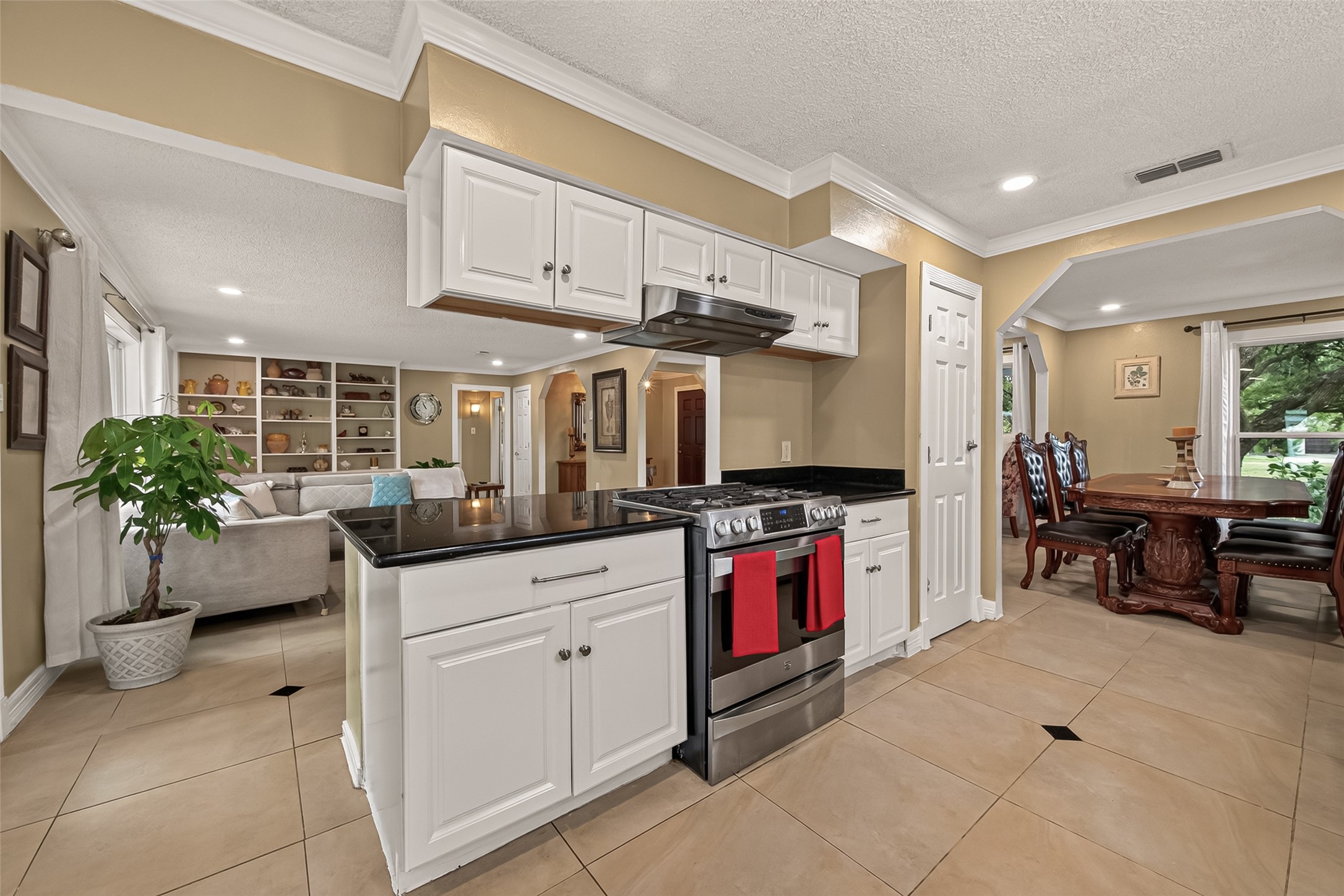 10807 Chimney Rock Road Houston, TX 77096 - Photo 13 of 35 The kitchen opens to the den.