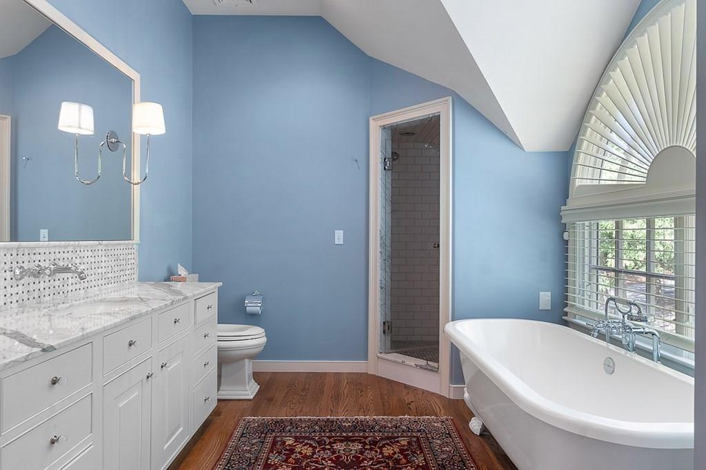 148 Monument Street Concord, MA 01742 - Photo 11 of 25 a bathroom with a bathtub sink and toilet