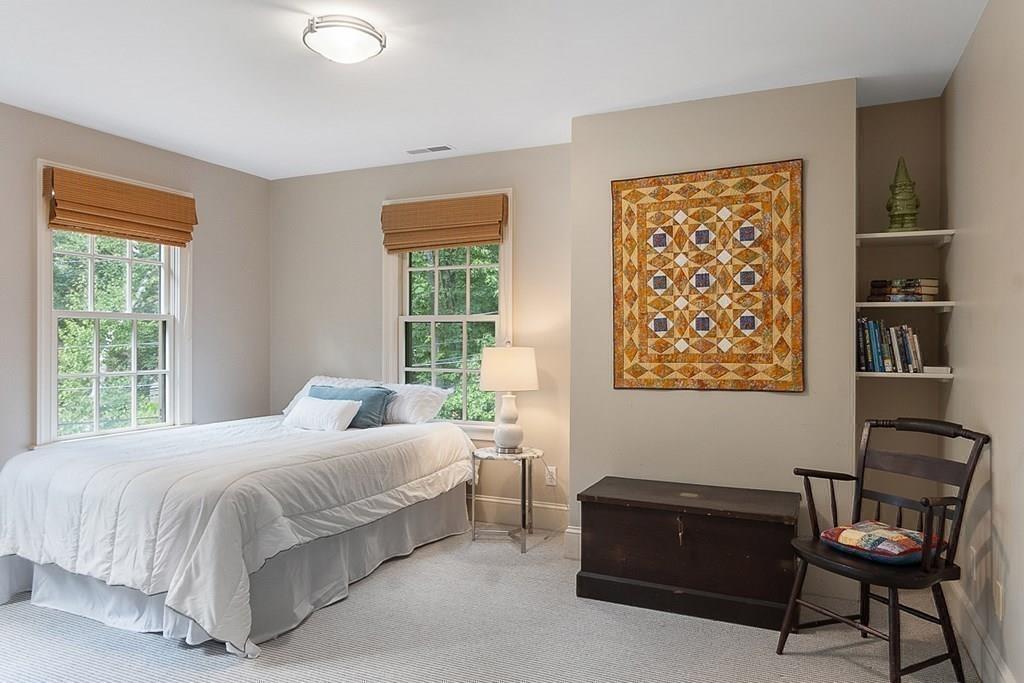 148 Monument Street Concord, MA 01742 - Photo 15 of 25 a bedroom with a bed and a window