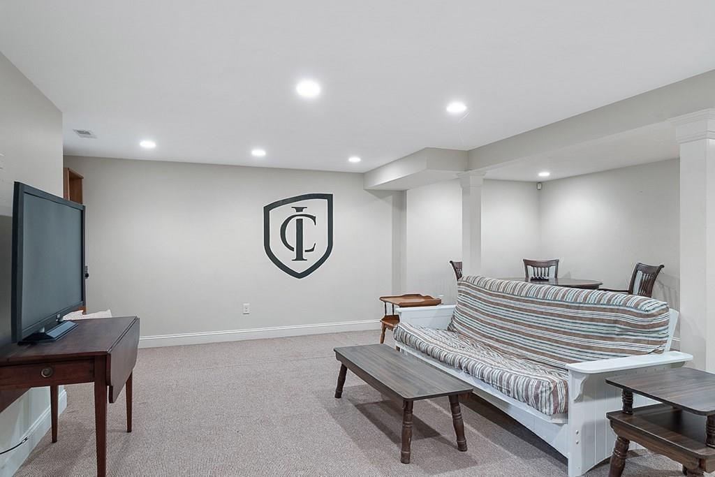 148 Monument Street Concord, MA 01742 - Photo 18 of 25 a projector room with a table and a chair