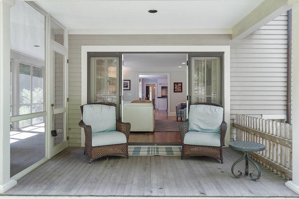 148 Monument Street Concord, MA 01742 - Photo 19 of 25 a living room with furniture and a potted plant