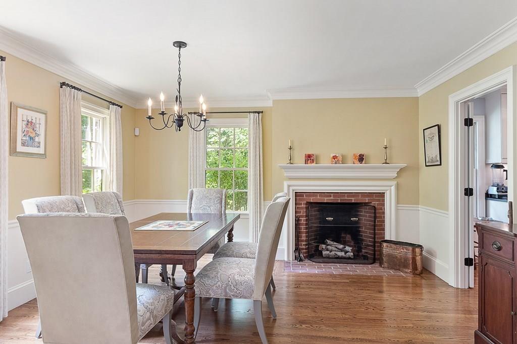 148 Monument Street Concord, MA 01742 - Photo 4 of 25 a view of a dining room with furniture window and wooden floor