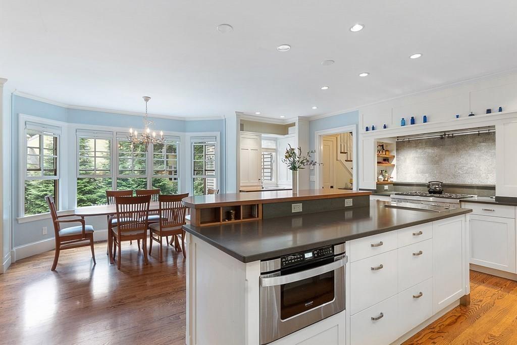 148 Monument Street Concord, MA 01742 - Photo 7 of 25 a kitchen with stainless steel appliances granite countertop a stove and a sink