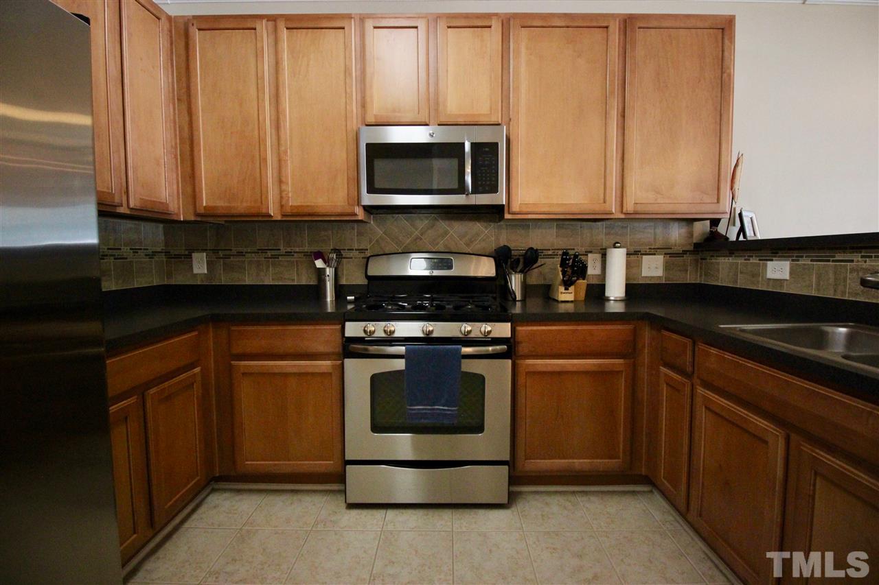 5059 Sandy Banks Road Raleigh, NC 27616 - Photo 4 of 25 All appliances convey and most of them are just one year old.