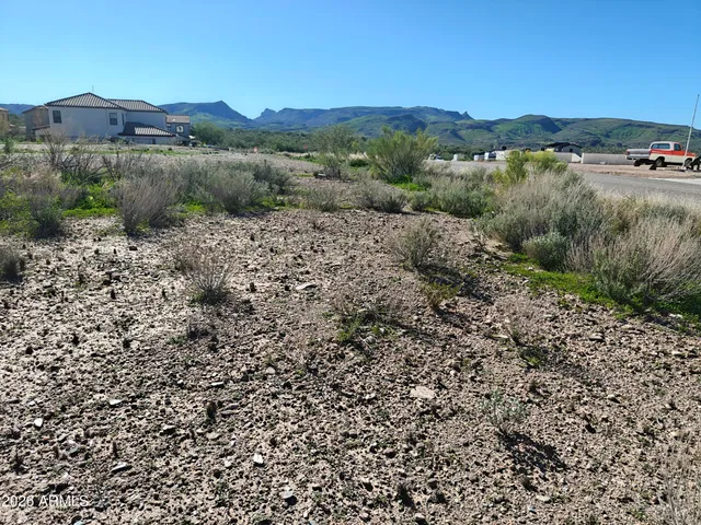a view of a lake with a mountain in the background