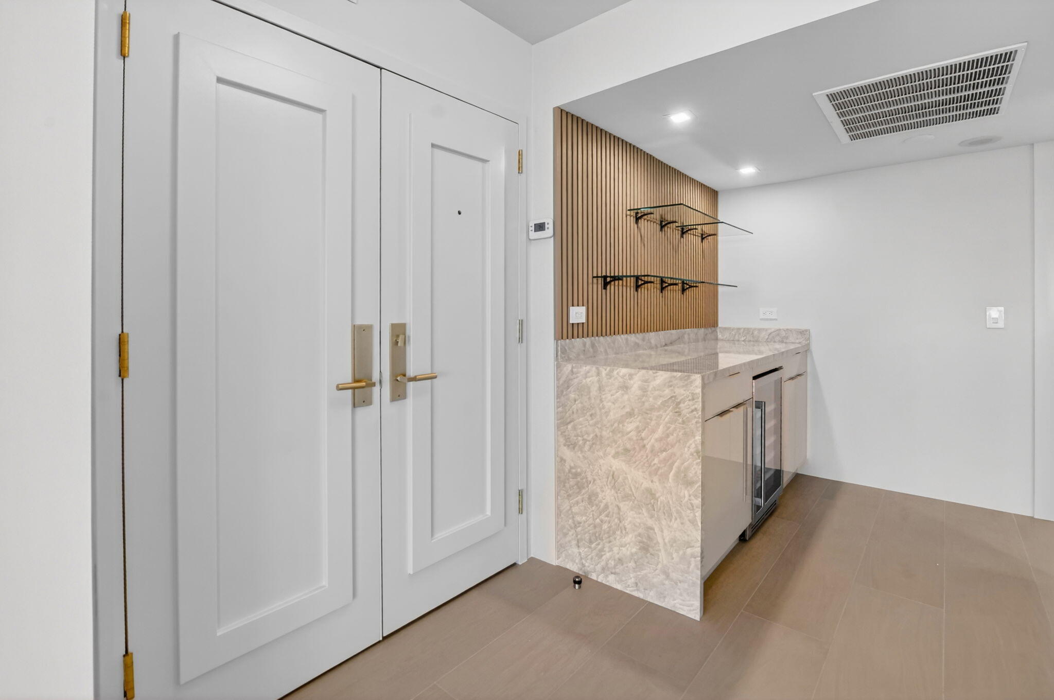 2800 South Ocean Boulevard, Unit 23C Boca Raton, FL 33432 - Photo 2 of 50 a view of a hallway with some storage