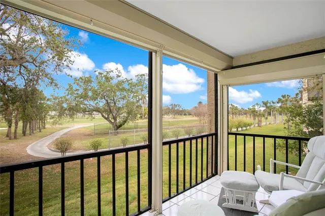 a view of a porch with a furniture