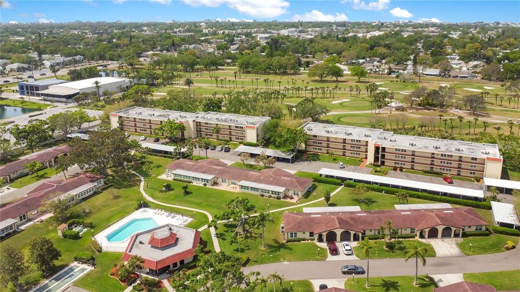 12200 Vonn Road, Unit 1209 Largo, FL 33774 - Photo 15 of 18 an aerial view of residential houses with outdoor space