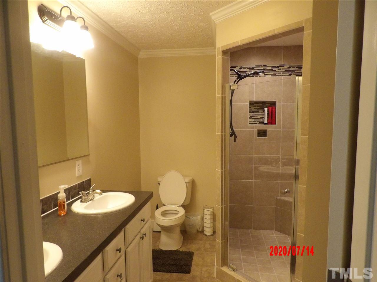 3247 Satterwhite Point Road Henderson, NC 27537 - Photo 12 of 20 Beautiful walk in tile shower