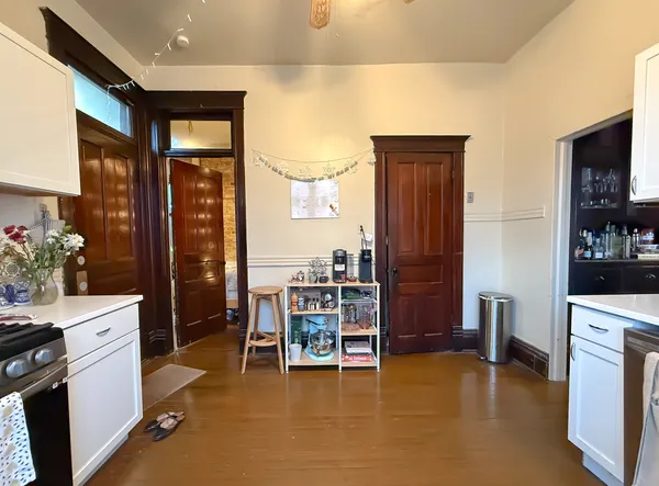 a room with wooden cabinets