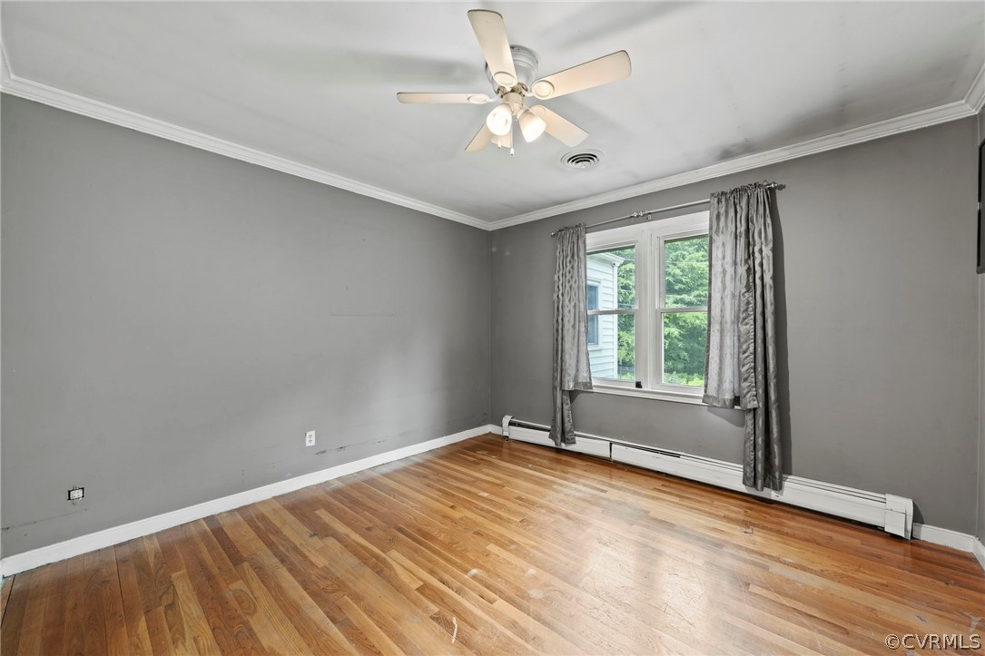4001 Croatan Road Richmond, VA 23235 - Photo 15 of 25 wooden floor in an empty room with a window