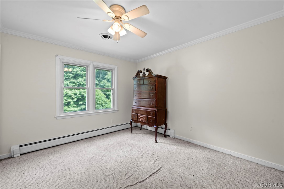 4001 Croatan Road Richmond, VA 23235 - Photo 16 of 25 a view of room with a ceiling fan and a window