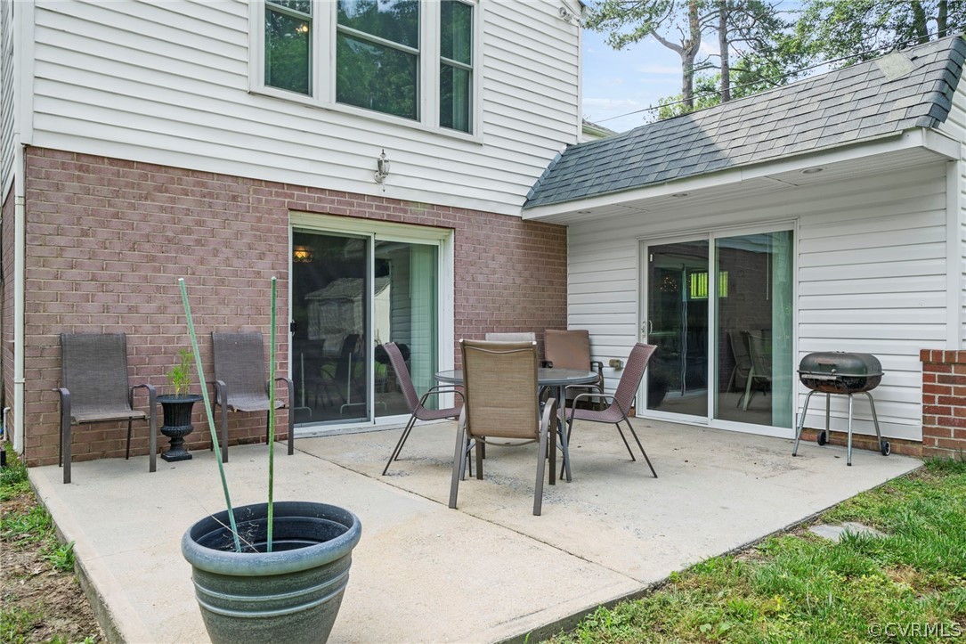4001 Croatan Road Richmond, VA 23235 - Photo 24 of 25 a patio with a table and chairs