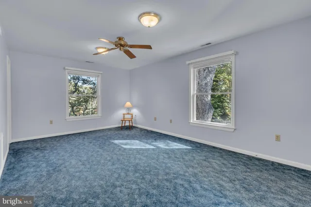 a bathroom with sink and mirror