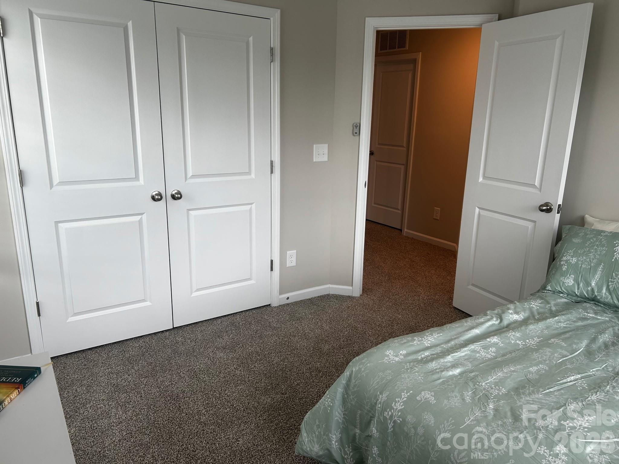 592 Altamonte Drive Clover, SC 29710 - Photo 18 of 22 a bedroom with a bed and hallway