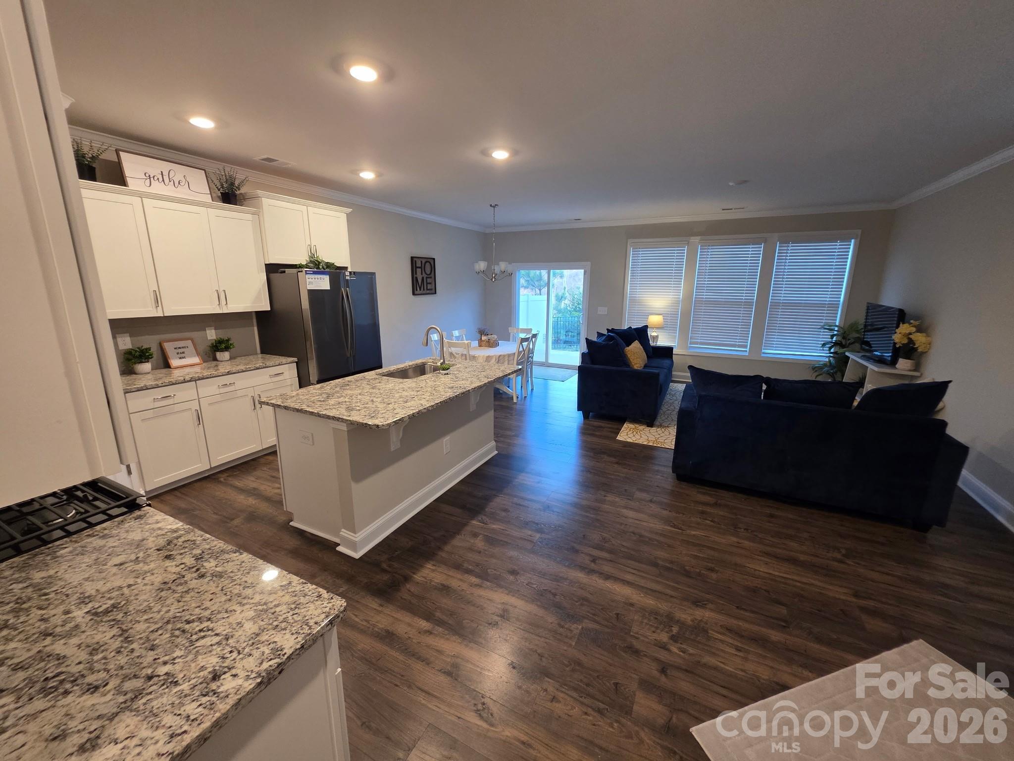 592 Altamonte Drive Clover, SC 29710 - Photo 2 of 22 a large living room with stainless steel appliances granite countertop furniture a fireplace and a sink