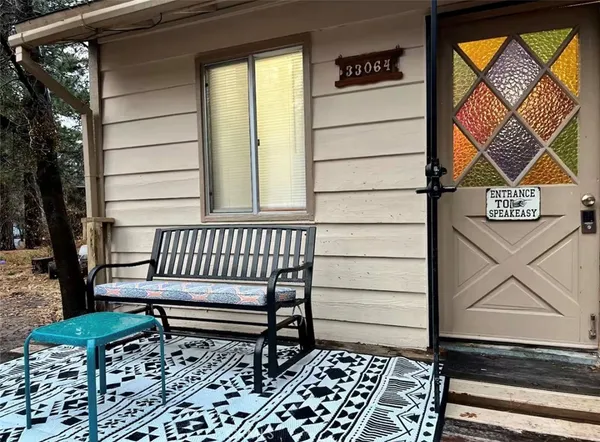 a bench sitting in front of a building