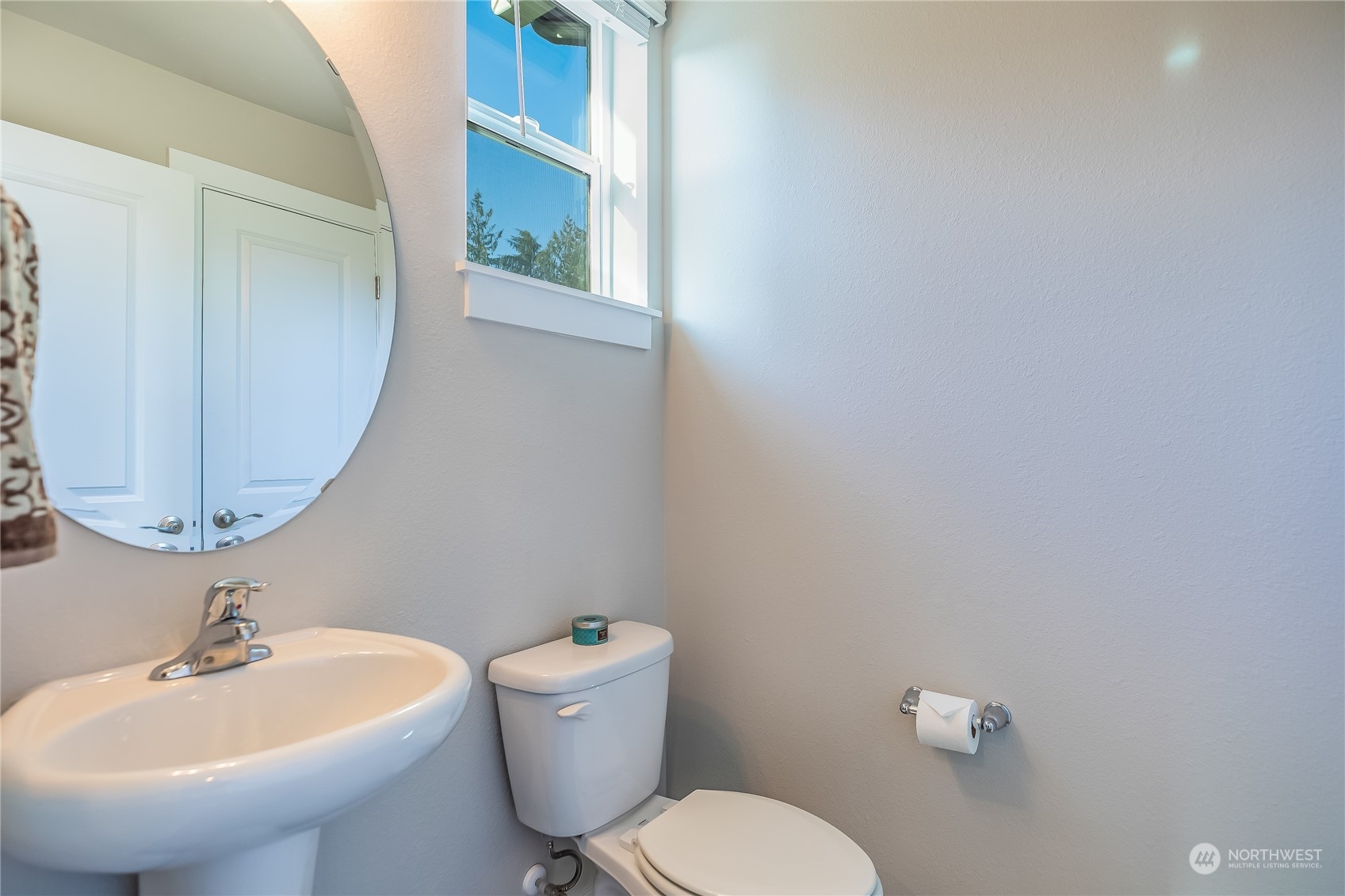 19308 35th Drive Southeast, Unit D Bothell, WA 98012 - Photo 12 of 32 a bathroom with a sink mirror and toilet