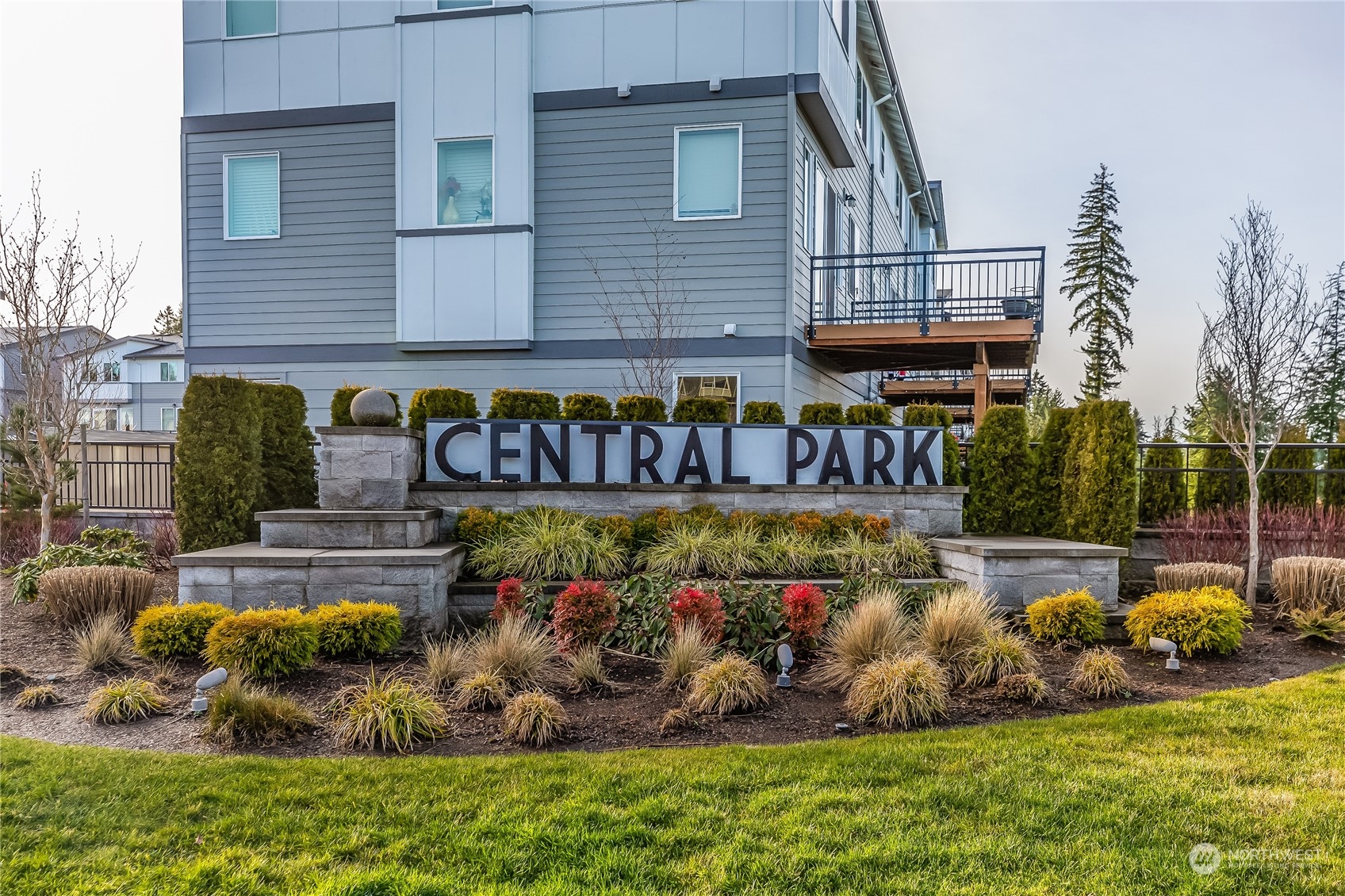 19308 35th Drive Southeast, Unit D Bothell, WA 98012 - Photo 2 of 32 a front view of a house with garden