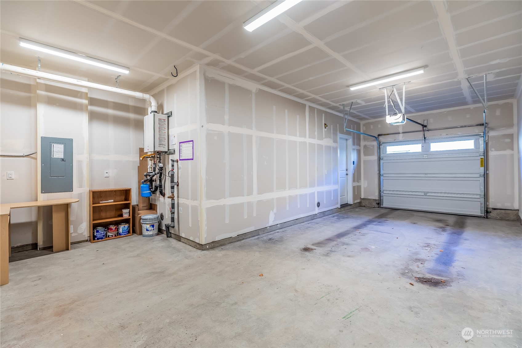 19308 35th Drive Southeast, Unit D Bothell, WA 98012 - Photo 27 of 32 a view of a garage with furniture