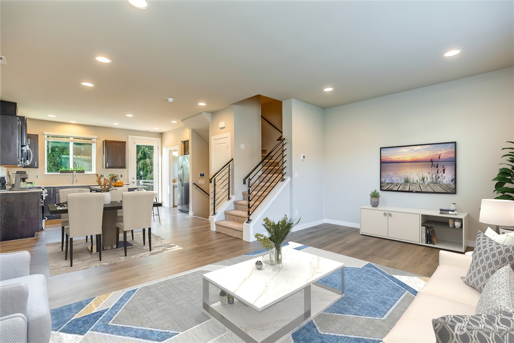 19308 35th Drive Southeast, Unit D Bothell, WA 98012 - Photo 6 of 32 a living room with furniture and a flat screen tv