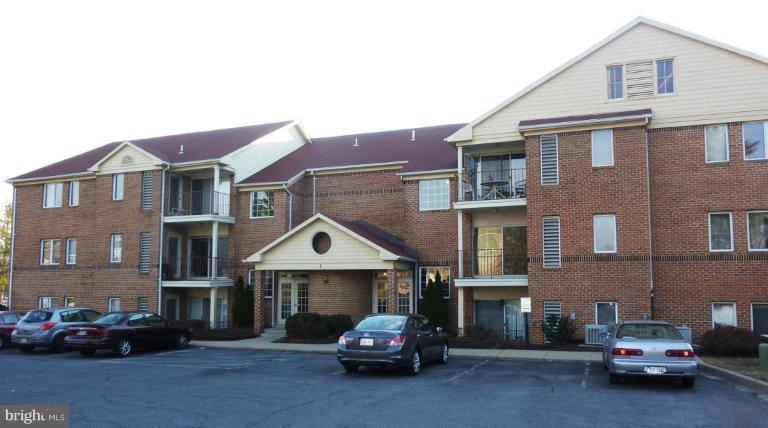 a car parked in front of a house