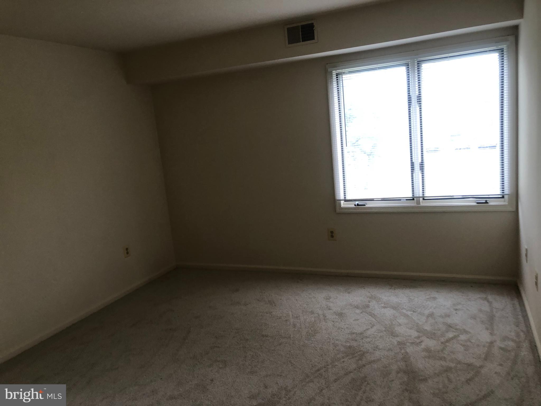 2 James Street, Unit 1B Frederick, MD 21701 - Photo 8 of 11 an empty room with a window