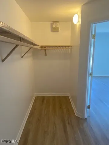 a view of a room with racks on the wall