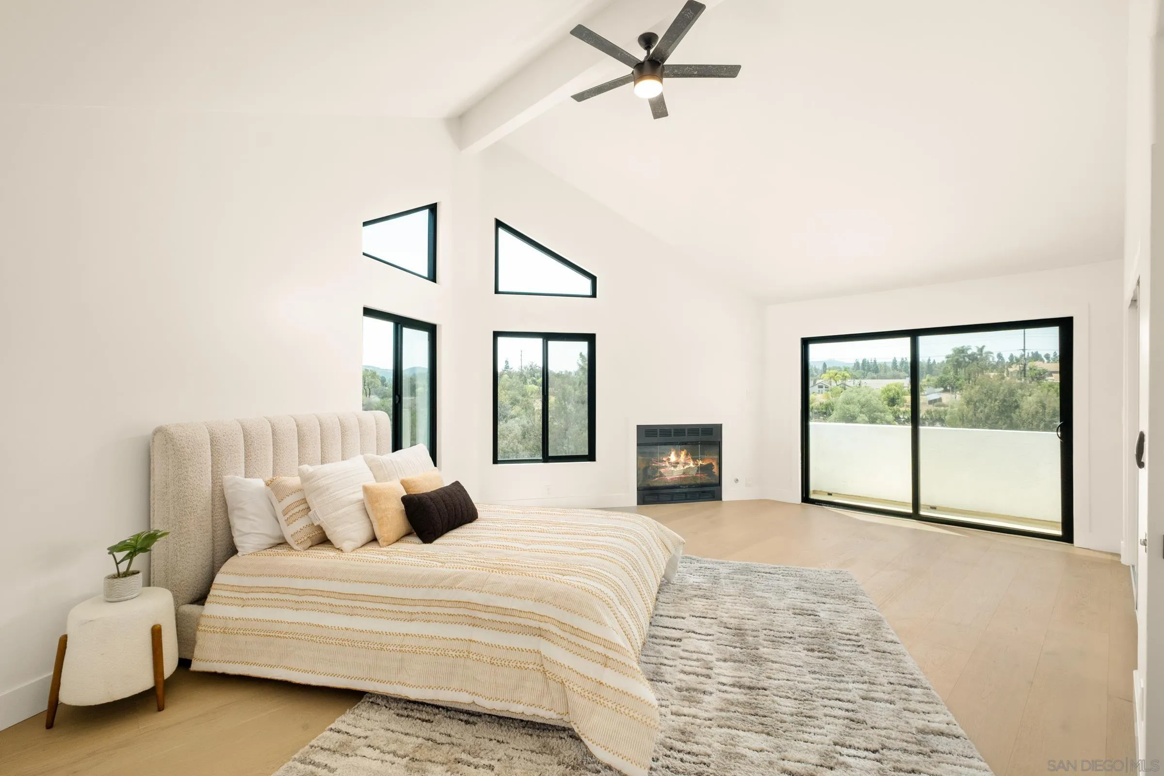 15032 Heath Drive Poway, CA 92064 - Photo 23 of 67 a spacious bedroom with a large bed and a large window