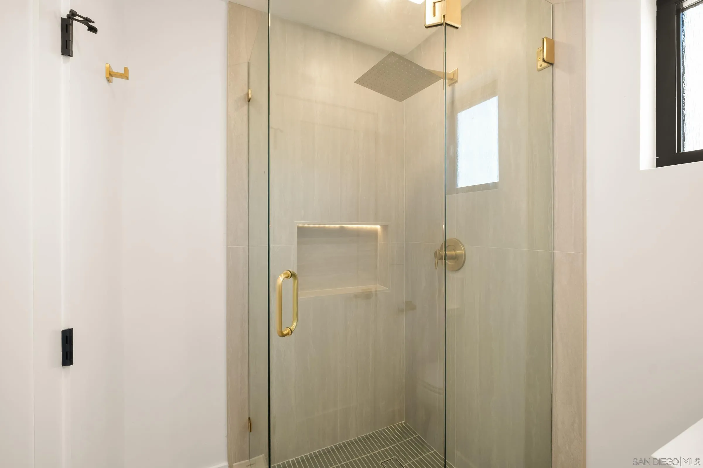 15032 Heath Drive Poway, CA 92064 - Photo 49 of 67 a bathroom with a shower and a sink