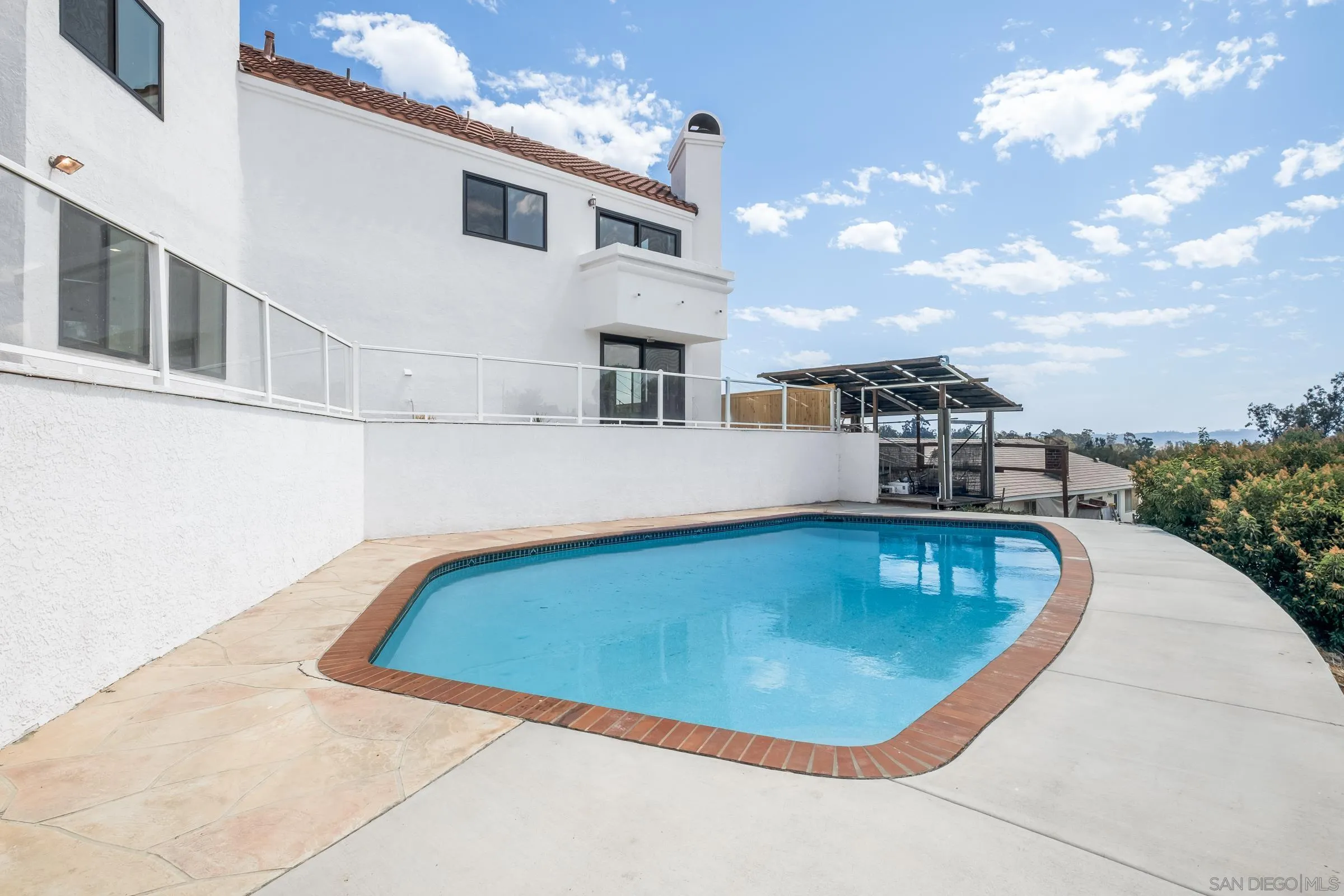 15032 Heath Drive Poway, CA 92064 - Photo 51 of 67 a view of a swimming pool with a yard