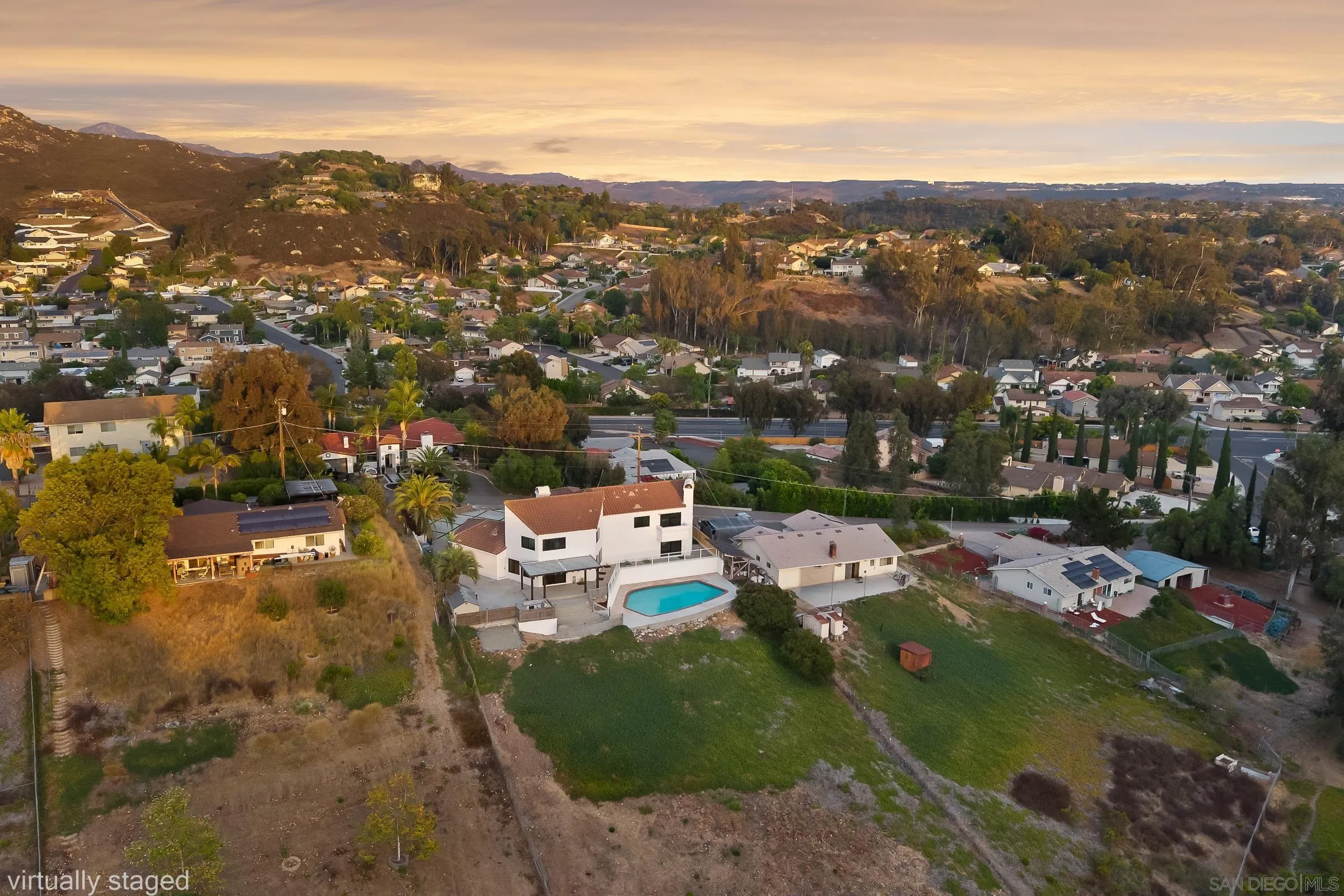 15032 Heath Drive Poway, CA 92064 - Photo 60 of 67 an aerial view of a city with lots of residential buildings