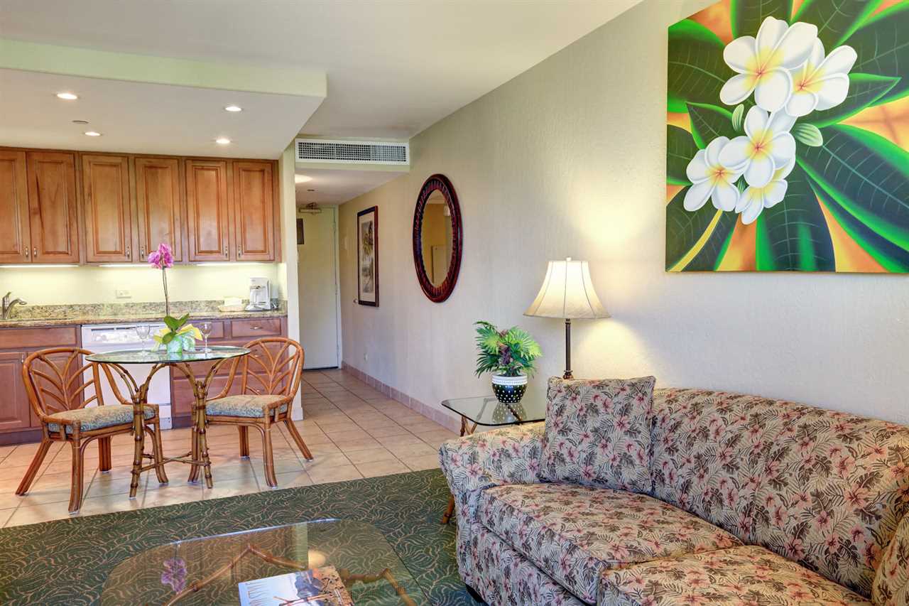 3445 Lower Honoapiilani Road, Unit 336 Lahaina, HI 96761 - Photo 11 of 22 a living room with furniture and a large window