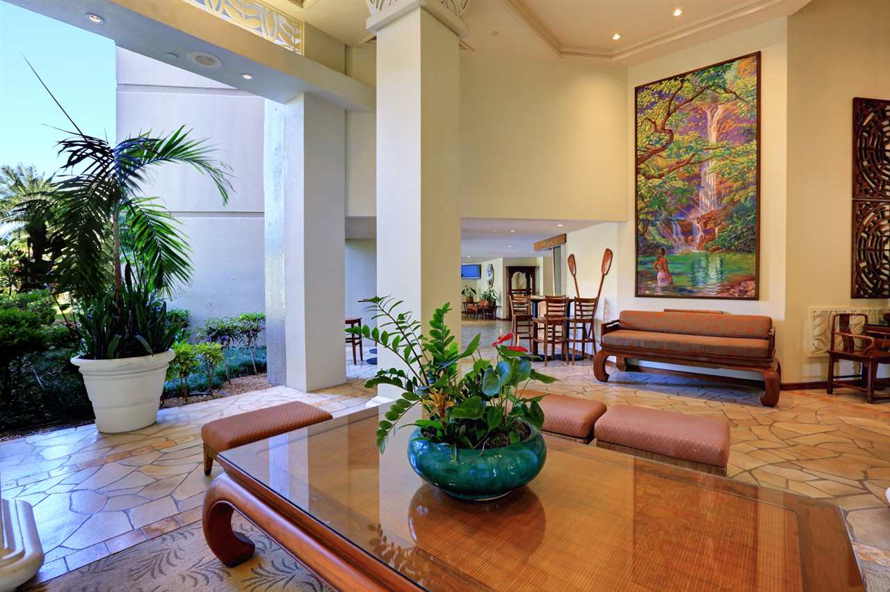 3445 Lower Honoapiilani Road, Unit 336 Lahaina, HI 96761 - Photo 20 of 22 a living room with furniture and flowers
