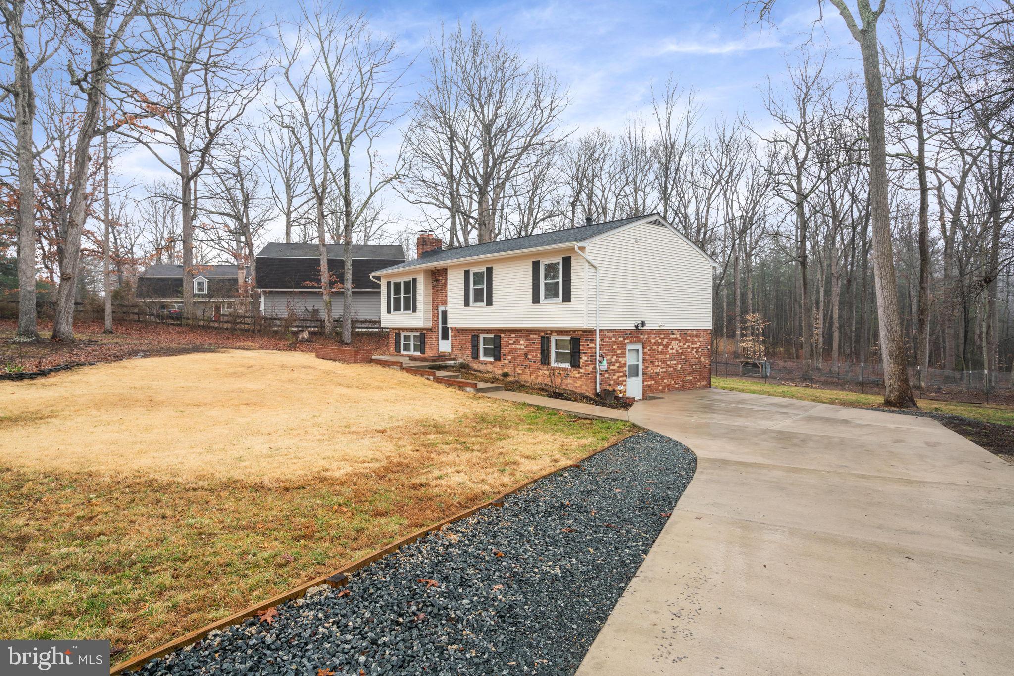 319 Cropp Road Fredericksburg, VA 22406 - Photo 6 of 43 Newly added & widened concrete driveway