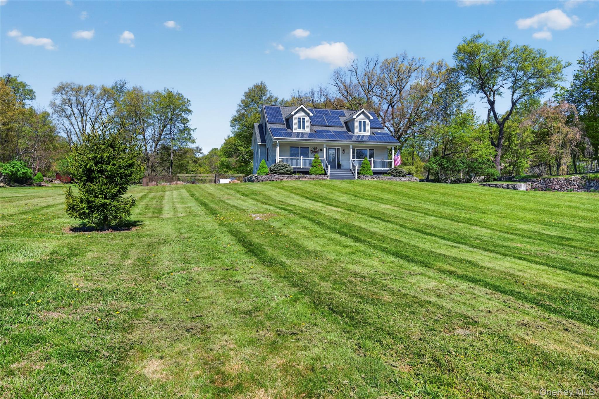 114 Last Road Middletown, NY 10941 - Photo 5 of 50 An expansive front lawn leads to a impeccably maintained cape cod