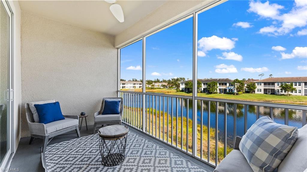 4601 Arboretum Circle, Unit 202 Naples, FL 34112 - Photo 19 of 37 a view of balcony with couch