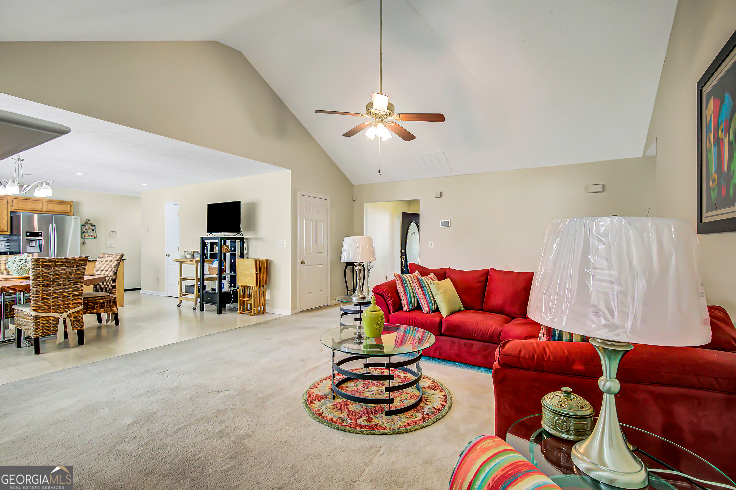 12350 Riviera Drive Fayetteville, GA 30215 - Photo 12 of 49 a living room with furniture and kitchen view