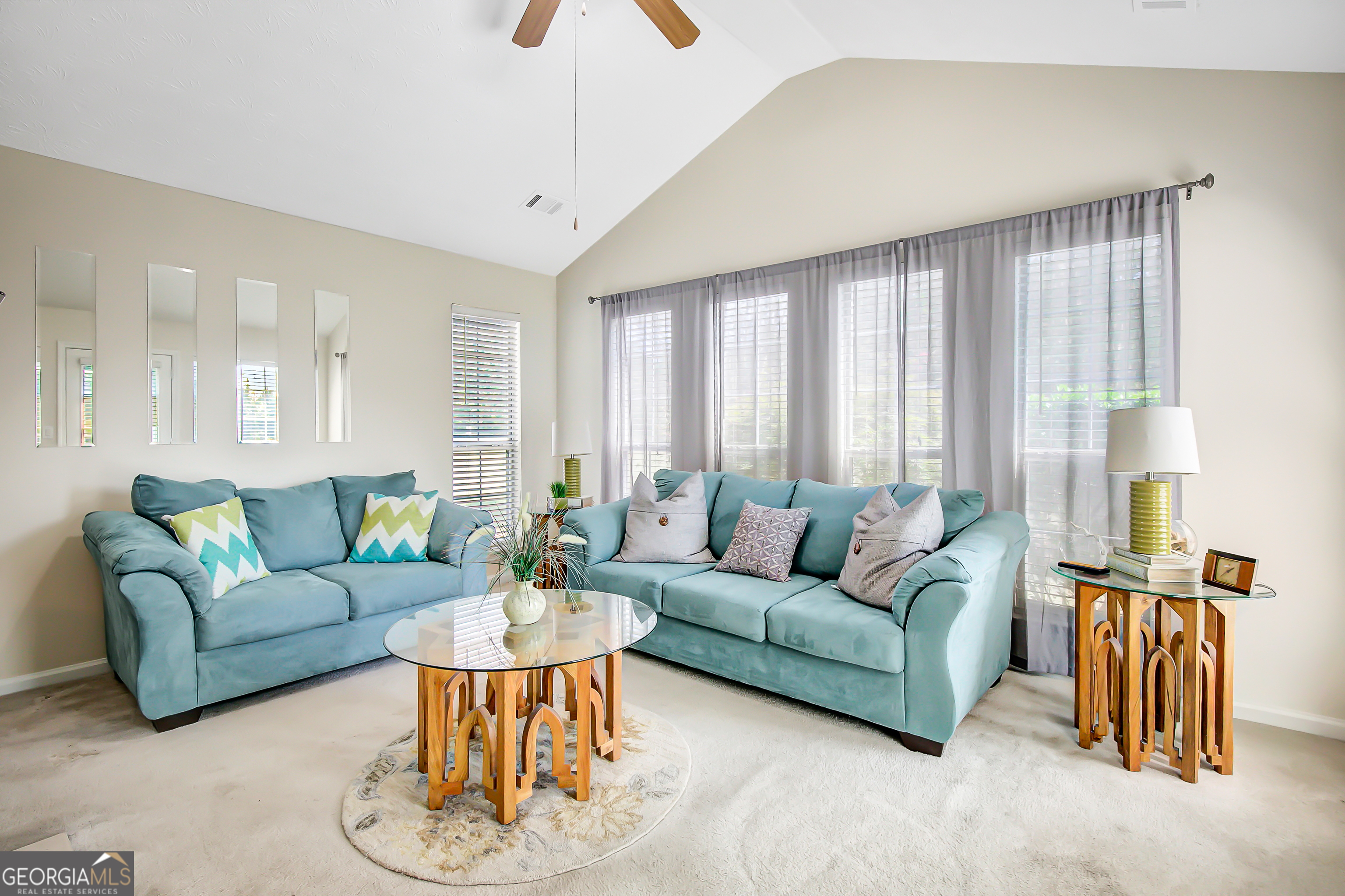 12350 Riviera Drive Fayetteville, GA 30215 - Photo 21 of 49 a living room with furniture and a large window