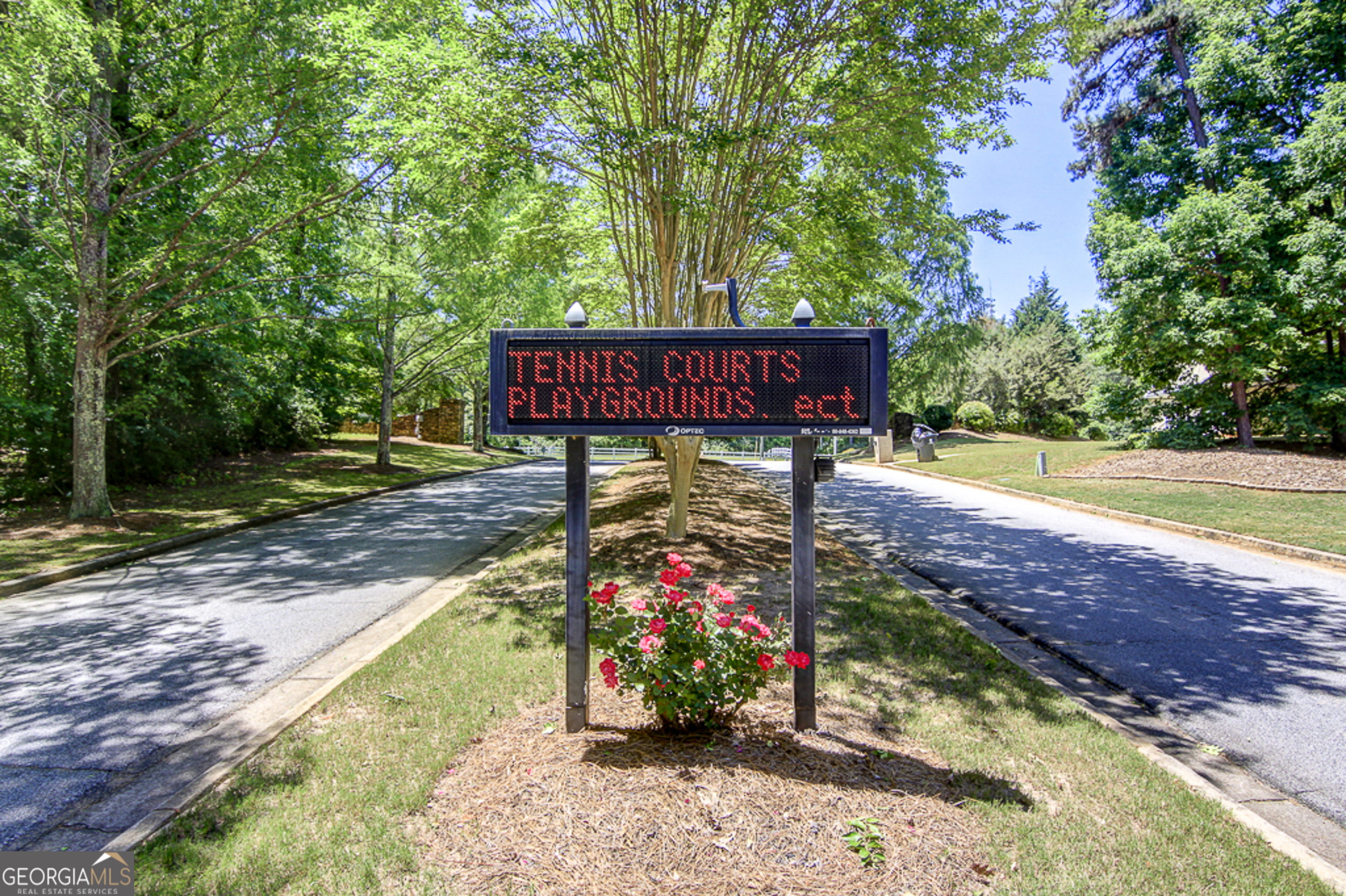 12350 Riviera Drive Fayetteville, GA 30215 - Photo 41 of 49 a view of a wooden house with a yard
